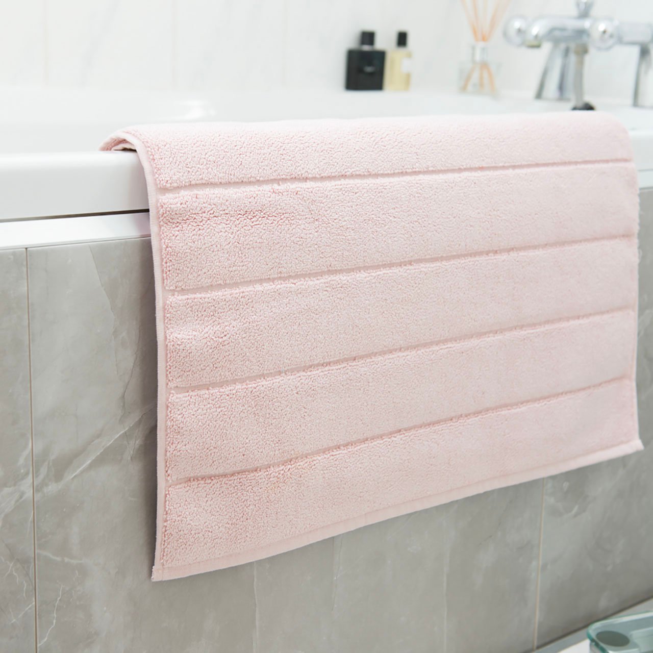 Pink bath mat and towels sale