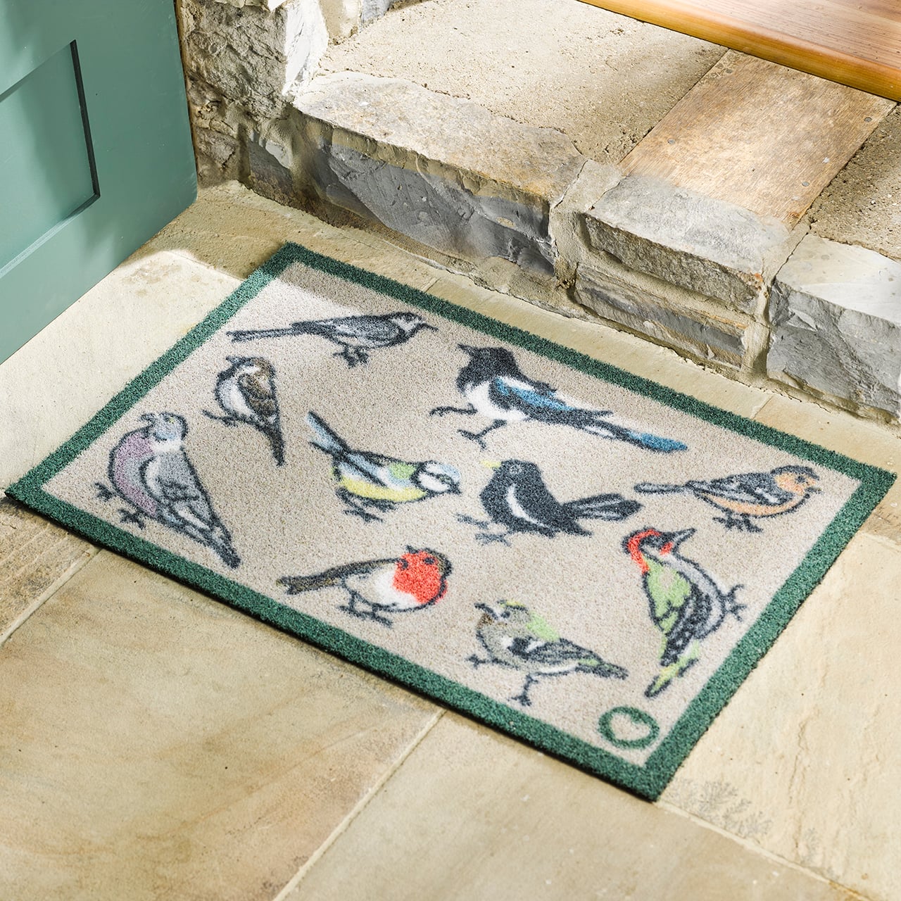 Feathered Friends Outdoor Mat