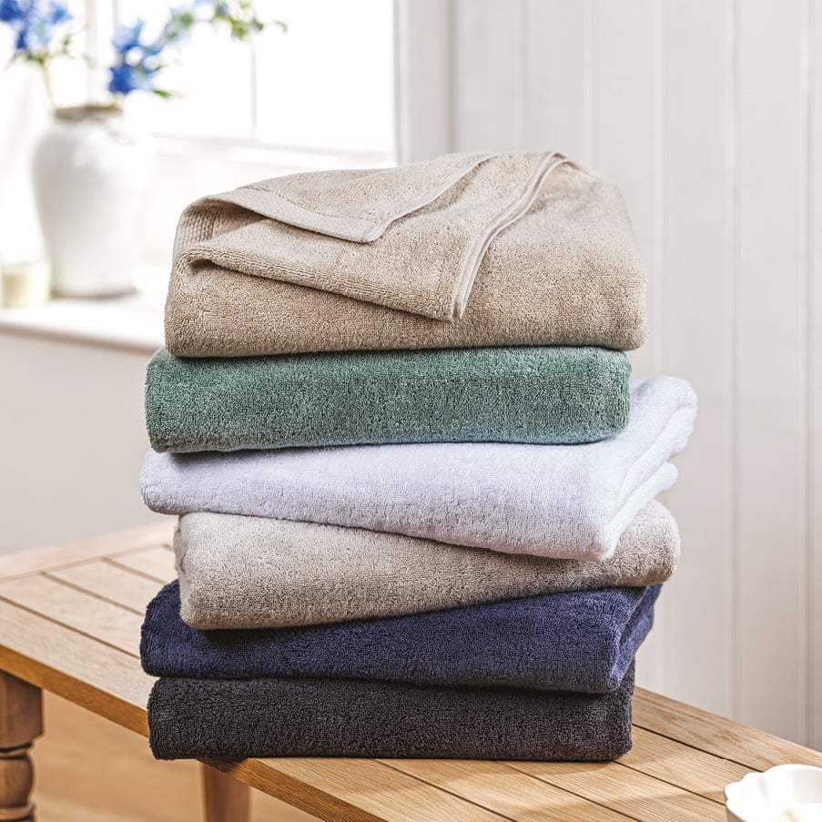 Stack of towels in various colours