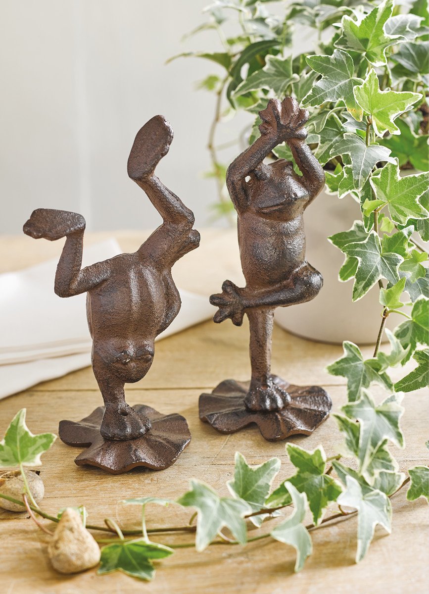 Pair of bronze frog statues in yoga poses