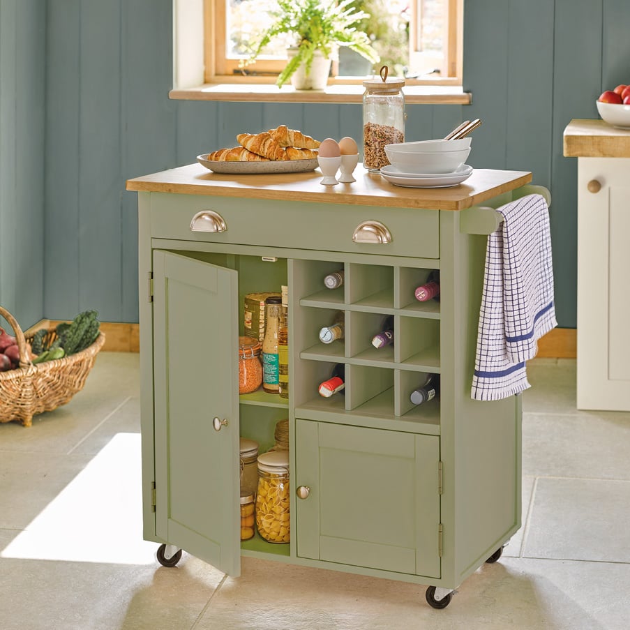 Sage green wooden storage unit for kitchen, with 2 cupboards and wine storage