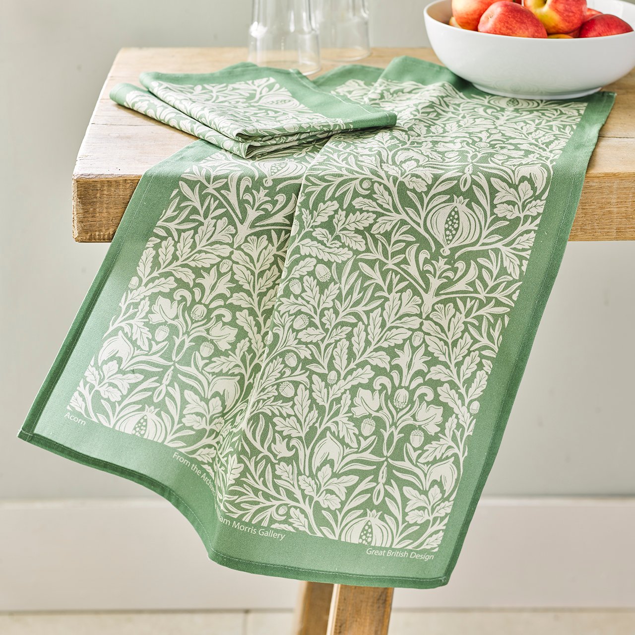 Image of green tea towel in William Morris pattern