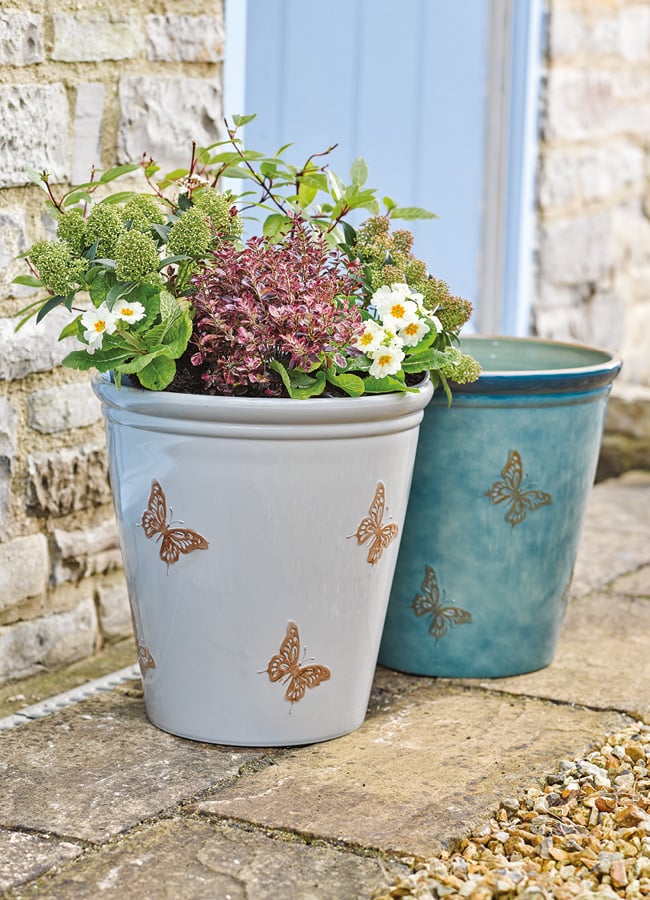 4 multicolour utility towels hanging from hooks