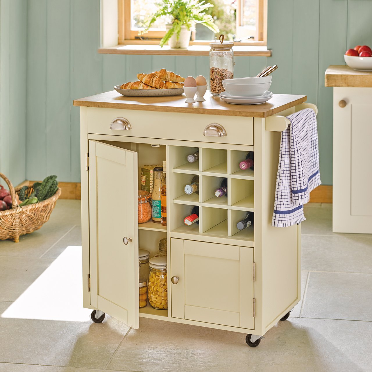 Cream wooden kitchen unit with 2 cupboards and a wine store