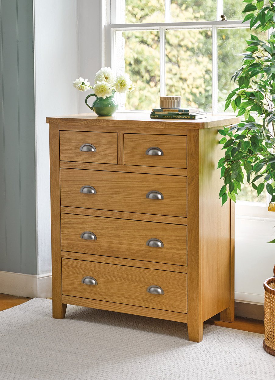 Oak 5 drawer unit in front of window