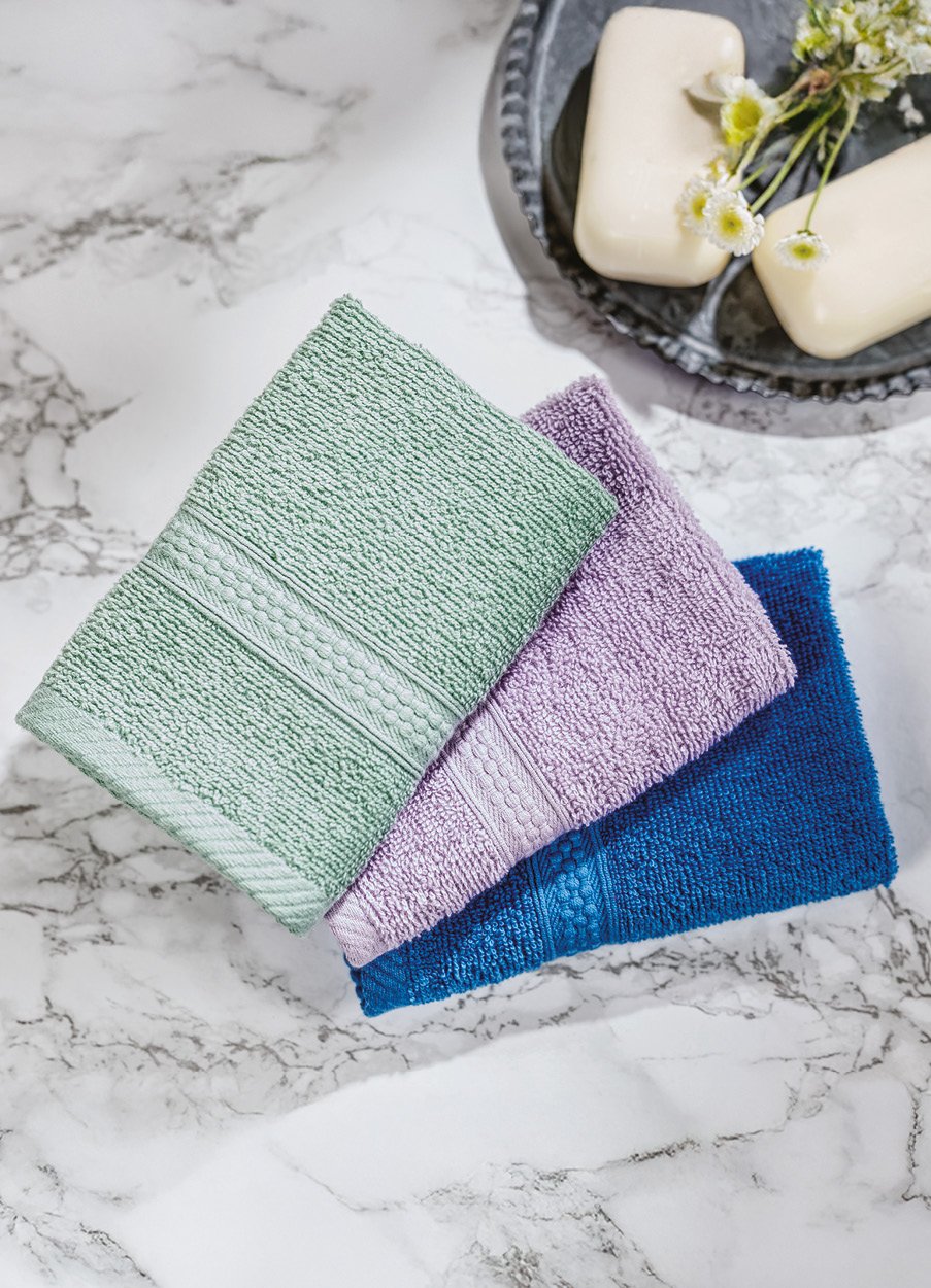 3 folded flannels, in green, purple and blue