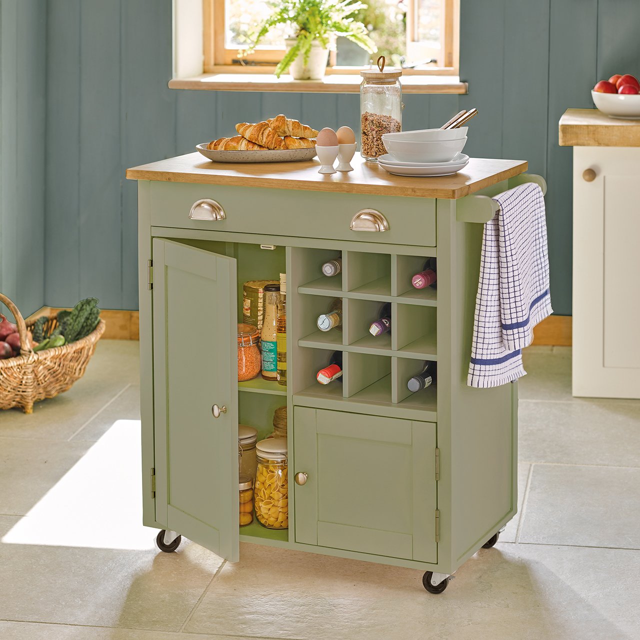 Sage Green wooden kitchen unit with 2 cupboards and a wine store