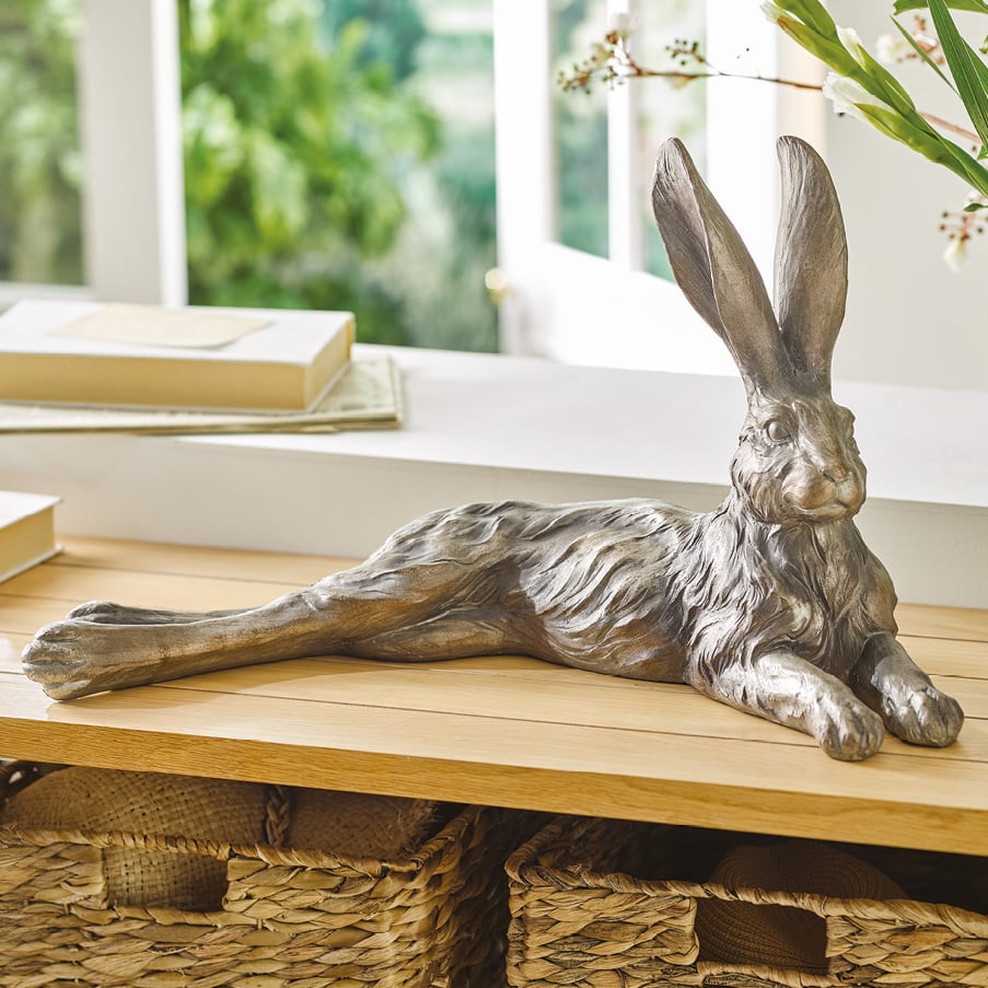 Sculpture of hare lying down 