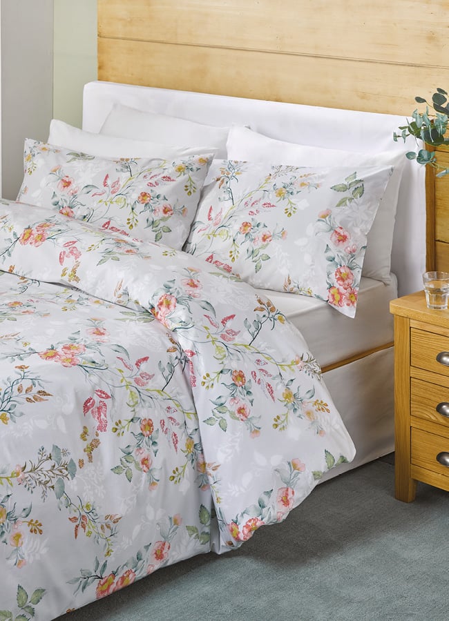 Floral design duvet cover on a bed