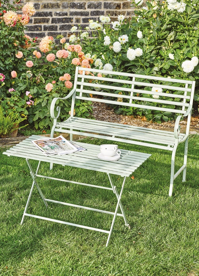 Sage slatted metal garden bench and matching table