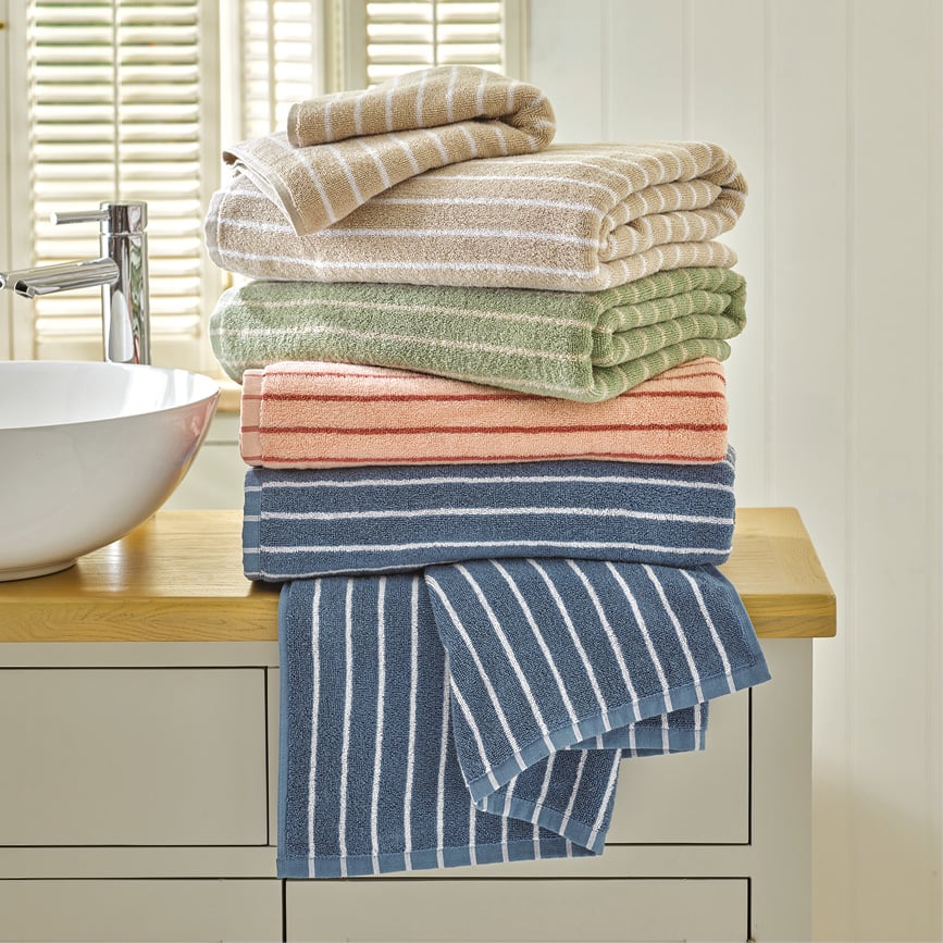 Stack of towels in various colours