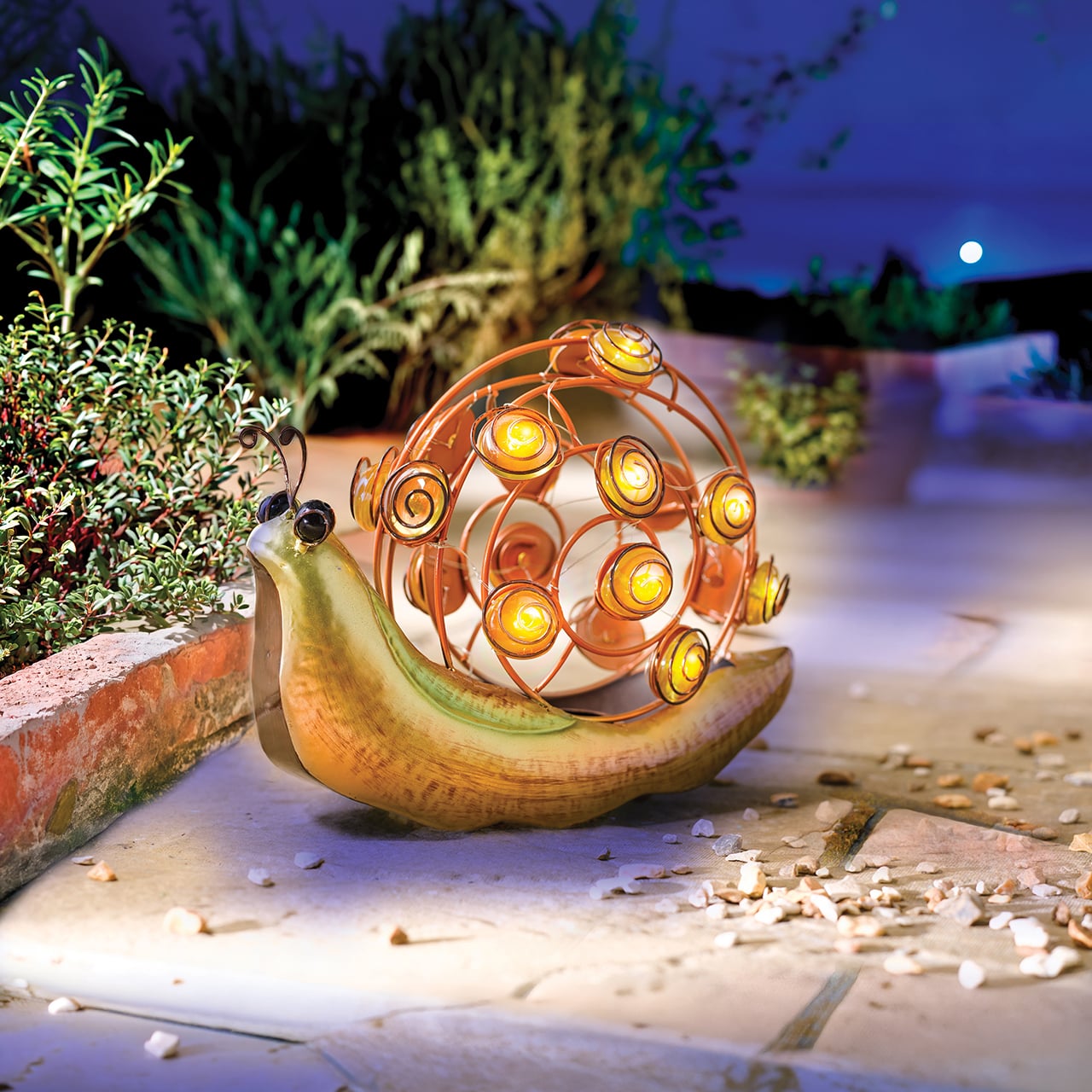 Solar garden light shaped like a snail with glowing circular bulbs
